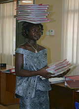 Field researcher carrying Clinical Report Forms
